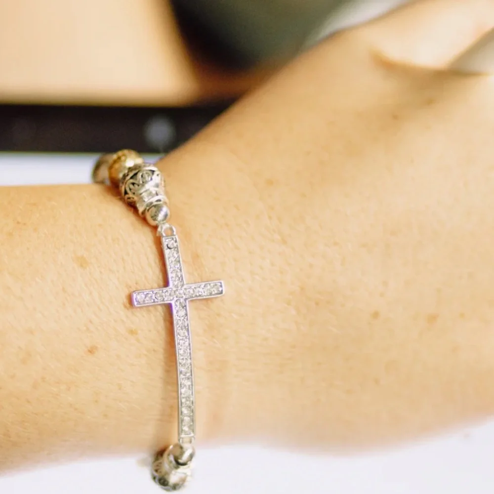 - New crystal cross stretch bracelet peach os